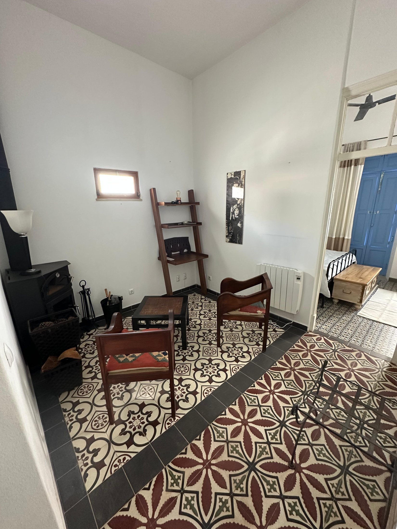 Traditional patterned Portuguese tiles and quiet interior details